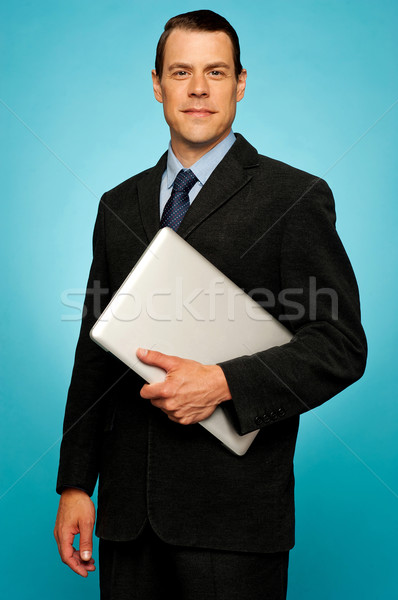 Imagine de stoc: Om · de · afaceri · laptop · prezinta · albastru · muncă