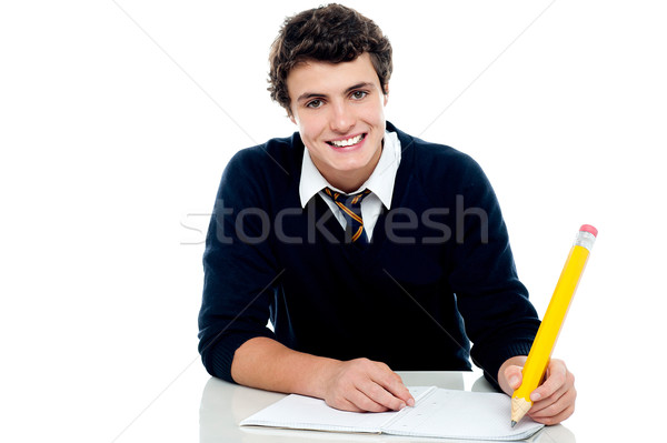 Lächelnd anziehend Youngster kid Studium isoliert Stock foto © stockyimages