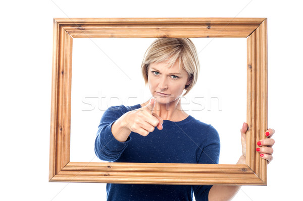 Zangado senhora moldura de madeira mulher Foto stock © stockyimages