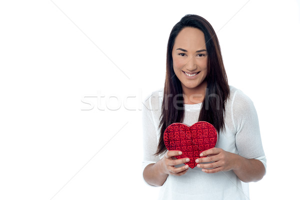 Young happy smiling woman with gift box Stock photo © stockyimages