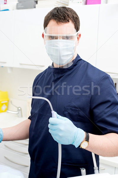 Stok fotoğraf: Dişçi · diş · araçları · erkek · poz