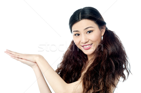 Pretty young girl over white Stock photo © stockyimages