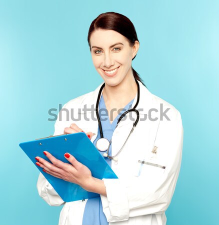 Kadın doktor belgeler genç doktor çalışmak Stok fotoğraf © stockyimages