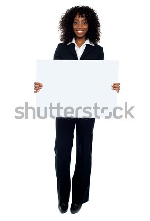 Business lady promoting big blank banner ad Stock photo © stockyimages