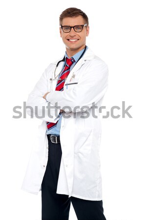 Stock photo: Cheerful young physician wearing eyeglasses