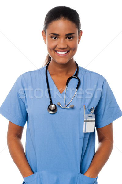 Jovem feminino médico mãos bolso metade do comprimento Foto stock © stockyimages