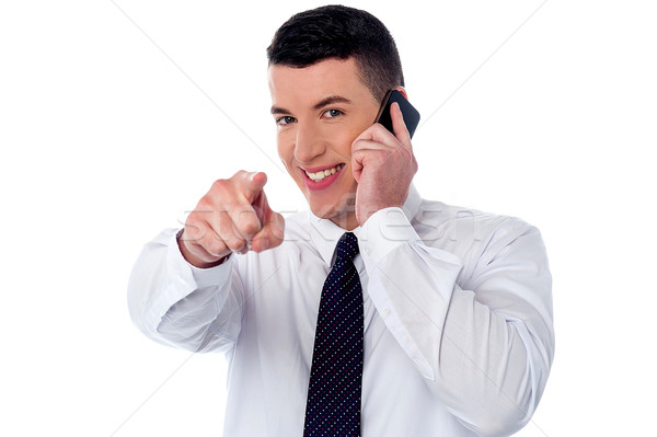 Businessman attending an important call Stock photo © stockyimages