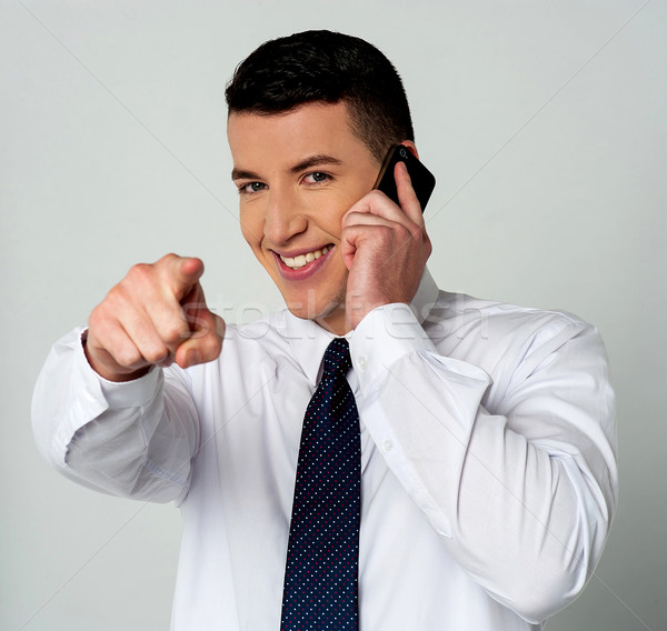 Businessman attending an important call Stock photo © stockyimages