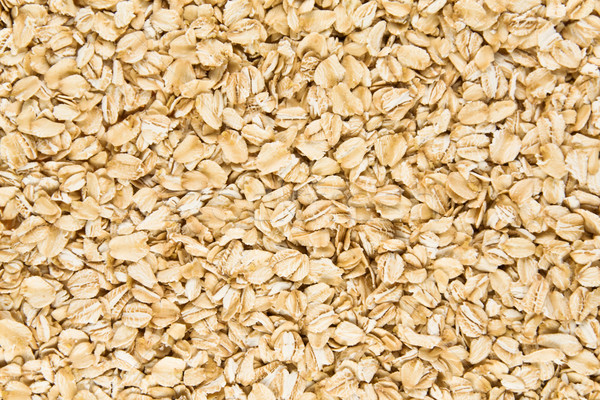 Background of raw oatmeal. Stock photo © stokato