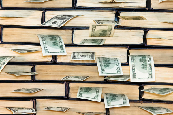 Dollars in books. Stock photo © stokato