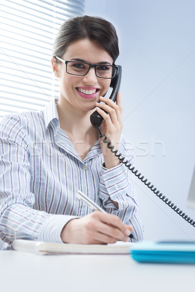 Attractive woman on the phone Stock photo © stokkete