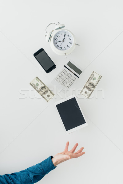 Negócio saldo relógio calculadora numerário dólares Foto stock © stokkete