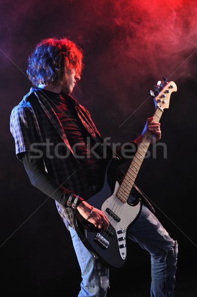 a bassist plays at a live concert Stock photo © stokkete