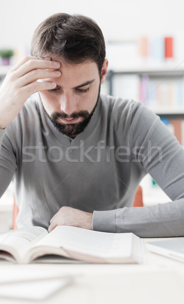 Man studying at the library Stock photo © stokkete