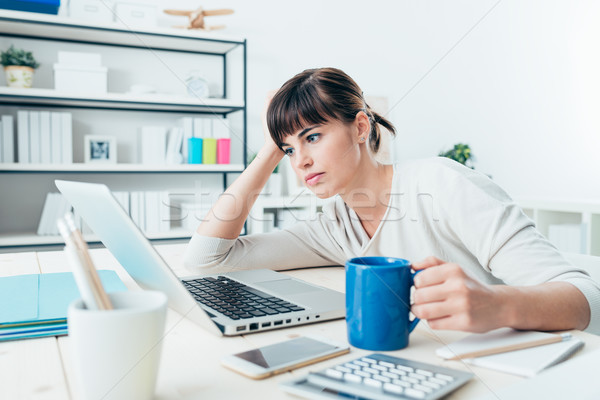 Tired woman at office desk Stock photo © stokkete