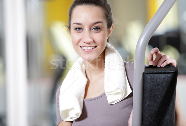 fitness portrait: A young female stays fit. Stock photo © stokkete