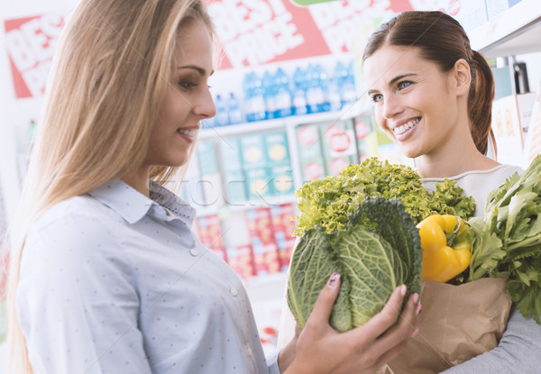 Women shopping together at the supermarket Stock photo © stokkete