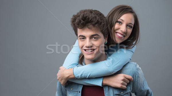 Stock photo: Happy young couple posing