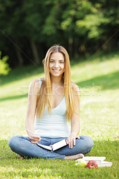 Smiling woman taking a break Stock photo © stokkete