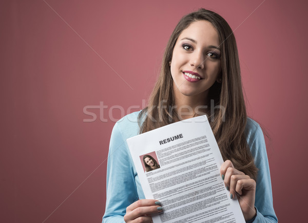 Young woman holding her resume Stock photo © stokkete