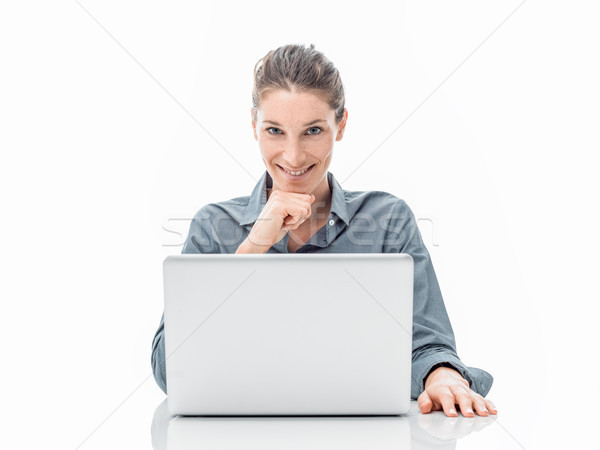 Smiling confident office worker posing Stock photo © stokkete