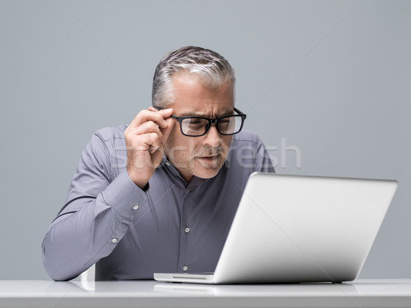 Businessman having vision problems Stock photo © stokkete