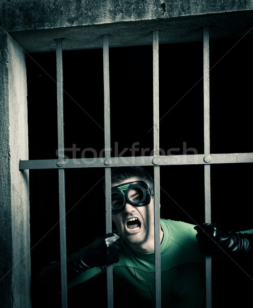 Superhero locked in prison Stock photo © stokkete