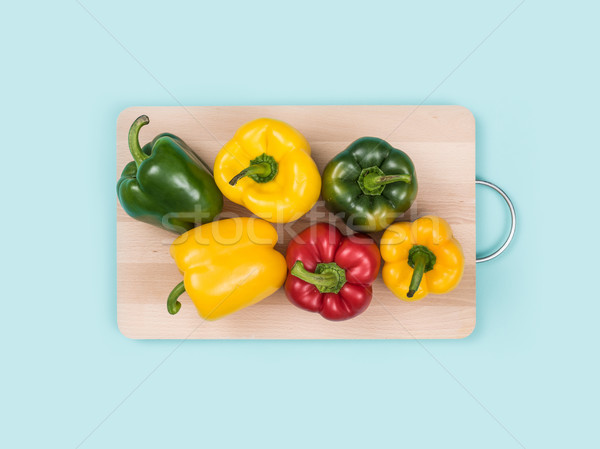 Fresh bell peppers on a chopping board Stock photo © stokkete