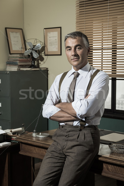 Confident businessman in his office Stock photo © stokkete