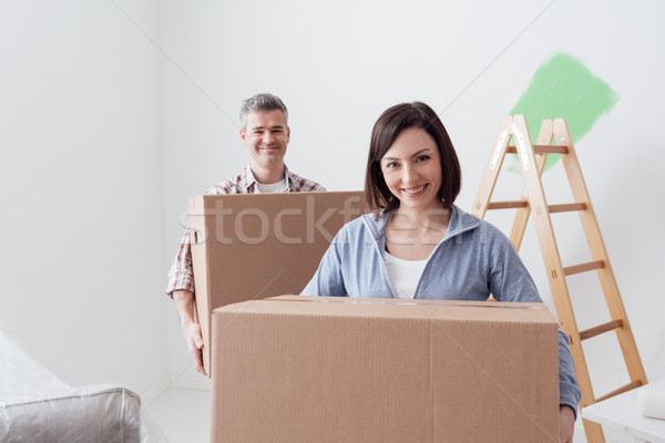 Couple moving into a new house Stock photo © stokkete