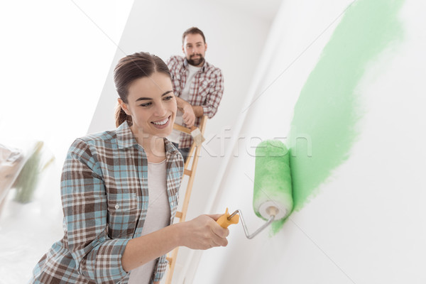 Couple renovating their new house Stock photo © stokkete