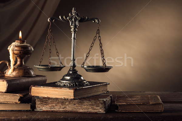 Old silver scale and books still life Stock photo © stokkete