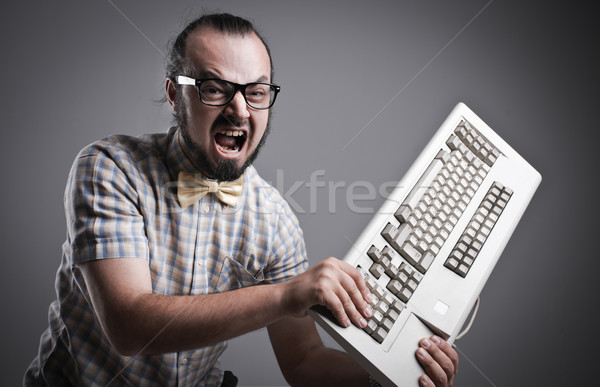 Bilgisayar sorunları öfkeli adam gözlük çılgın Stok fotoğraf © stokkete