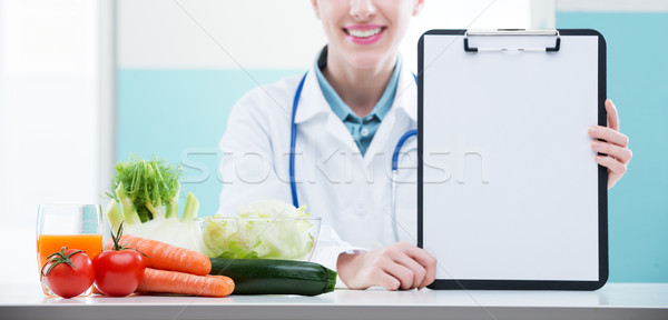 Nutricionista médico alegre salud profesional Foto stock © stokkete