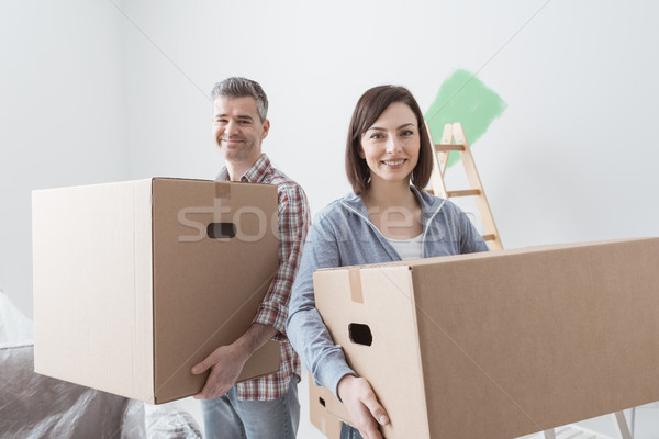 Paar bewegen glücklich home tragen Stock foto © stokkete