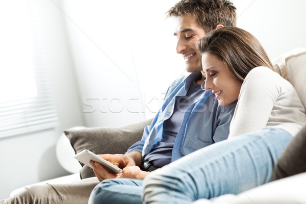 Couple watching movie on tablet Stock photo © stokkete