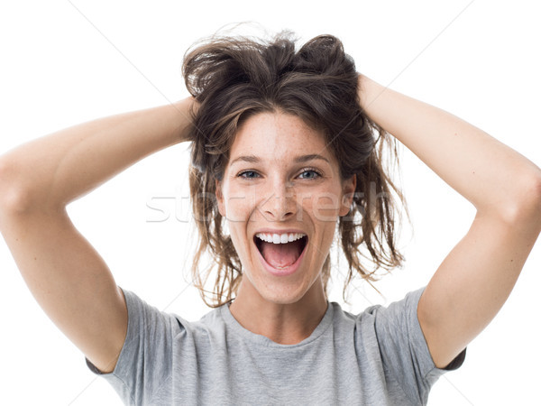 Cheerful woman with messy hair Stock photo © stokkete
