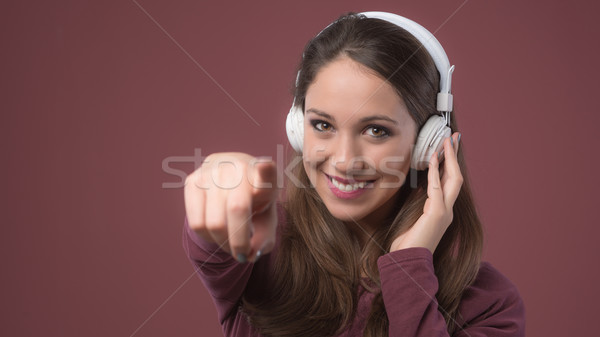 Smiling woman with headphones Stock photo © stokkete