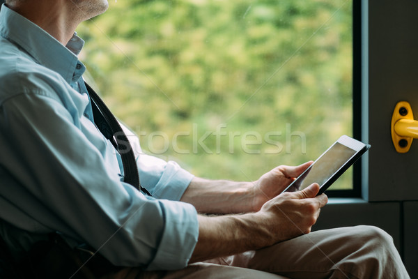Ingázás munka férfi busz dolgozik digitális Stock fotó © stokkete