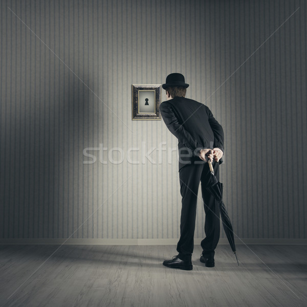 Nieuwsgierigheid zakenman naar sleutelgat fotografie spion Stockfoto © stokkete