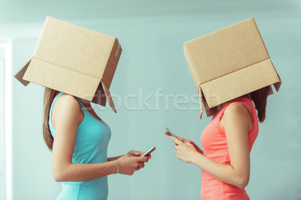 Hiány kommunikáció kamasz lányok dobozok sms chat Stock fotó © stokkete