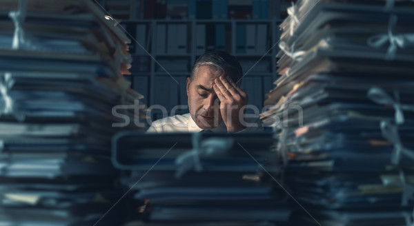 Business executive overloaded with work Stock photo © stokkete