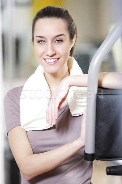 fitness portrait: A young female stays fit. Stock photo © stokkete