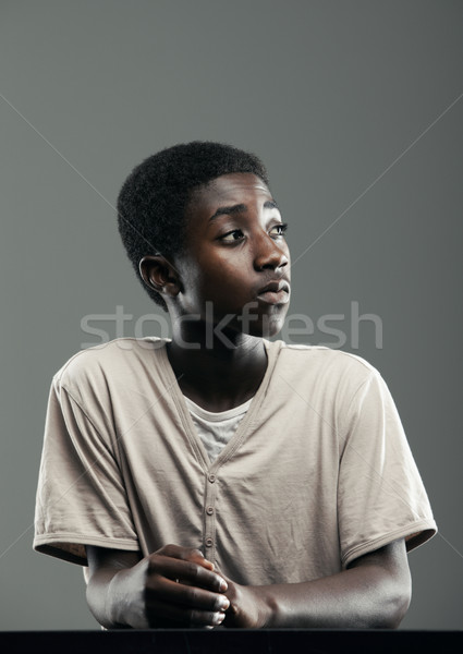Afrikai fiú portré férfi tinédzser szürke Stock fotó © stokkete