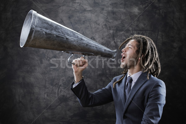 screaming into megaphone Stock photo © stokkete