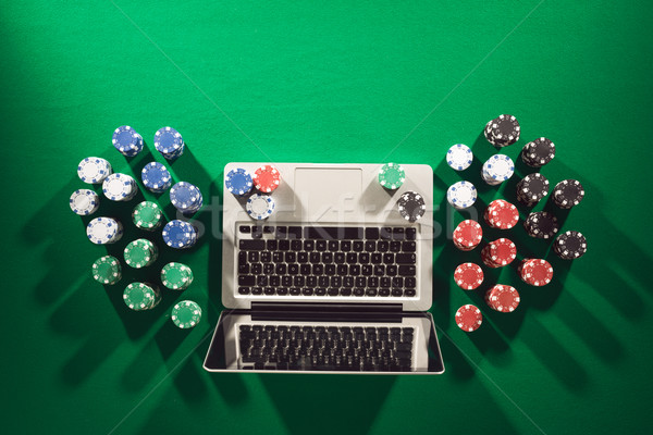 Poker casino online laptop chips Stockfoto © stokkete