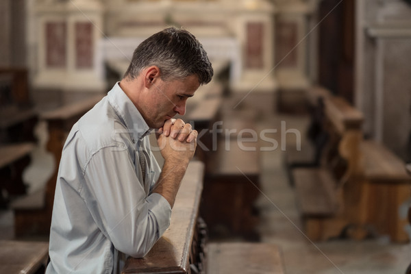 Religious man in the Church Stock photo © stokkete