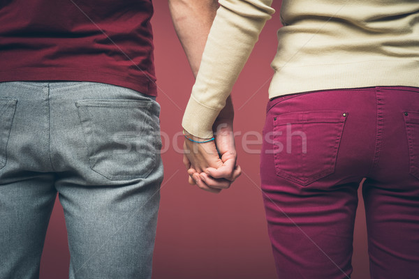 Couple holding hands Stock photo © stokkete
