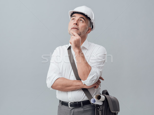 Thoughtful construction engineer Stock photo © stokkete