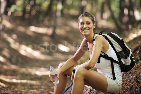 Female nordic walker Stock photo © stokkete
